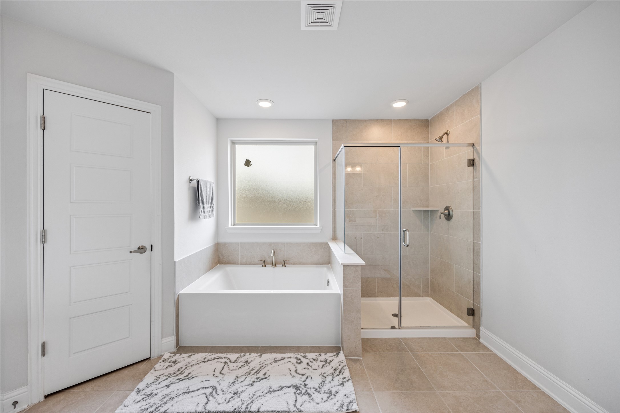 32906 Ruthie Dean Drive Brookshire, TX 77423 - Photo 19 of 23 a bathroom with a bathtub and a shower