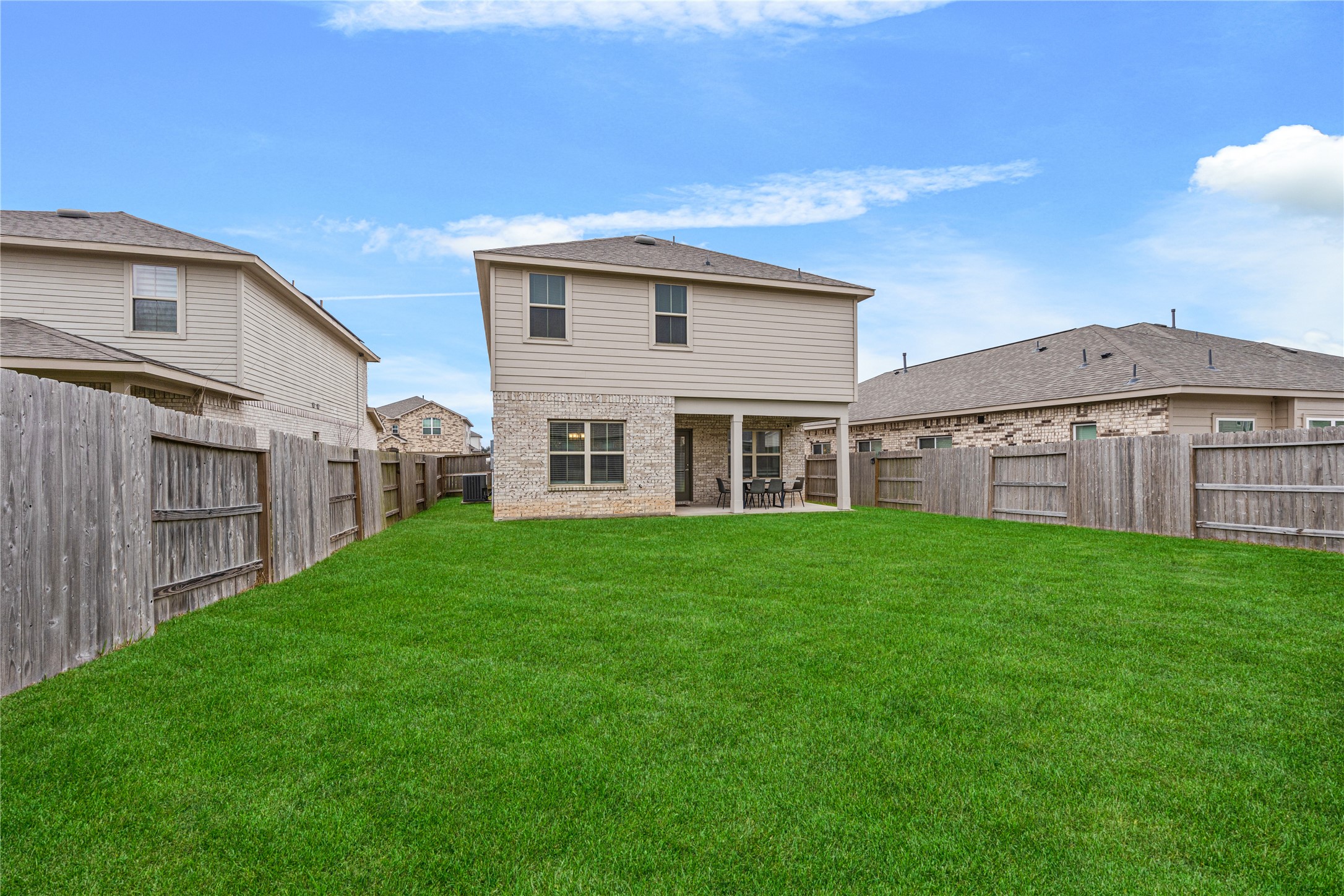 32906 Ruthie Dean Drive Brookshire, TX 77423 - Photo 21 of 23 a view of a house with backyard and garden