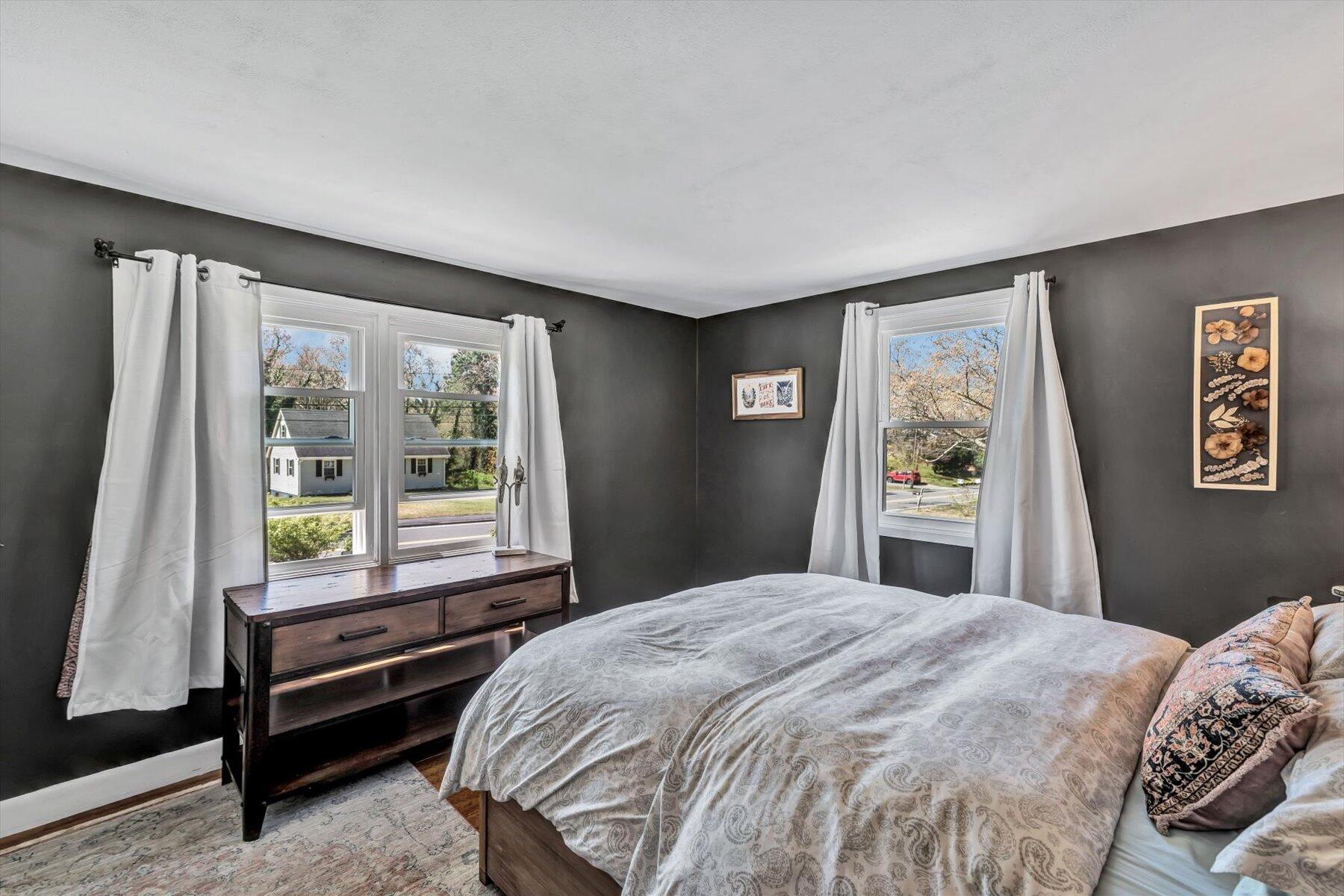 79 Clay Pond Road Monument Beach, MA 02532 - Photo 14 of 46 a bedroom with a bed and a window