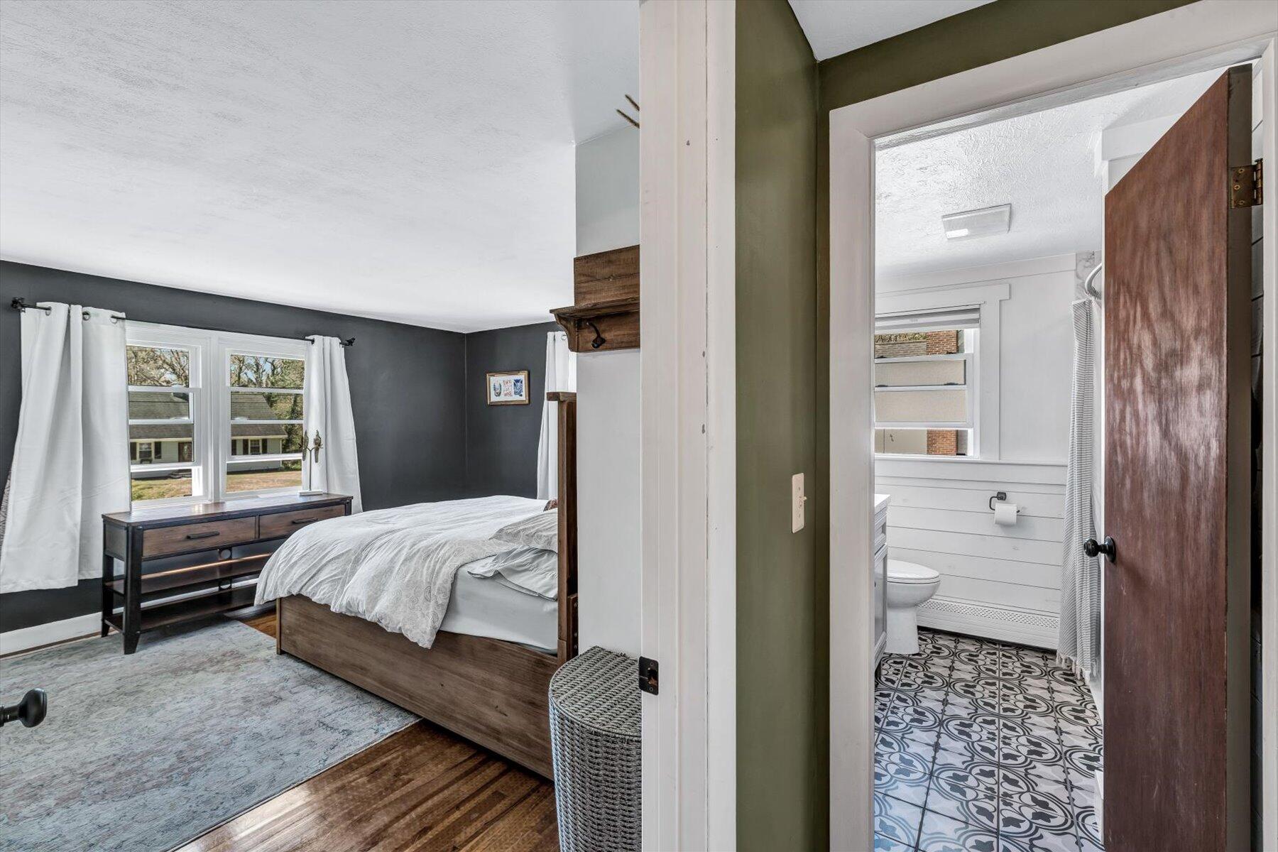 79 Clay Pond Road Monument Beach, MA 02532 - Photo 17 of 46 a bedroom with a bed and a window
