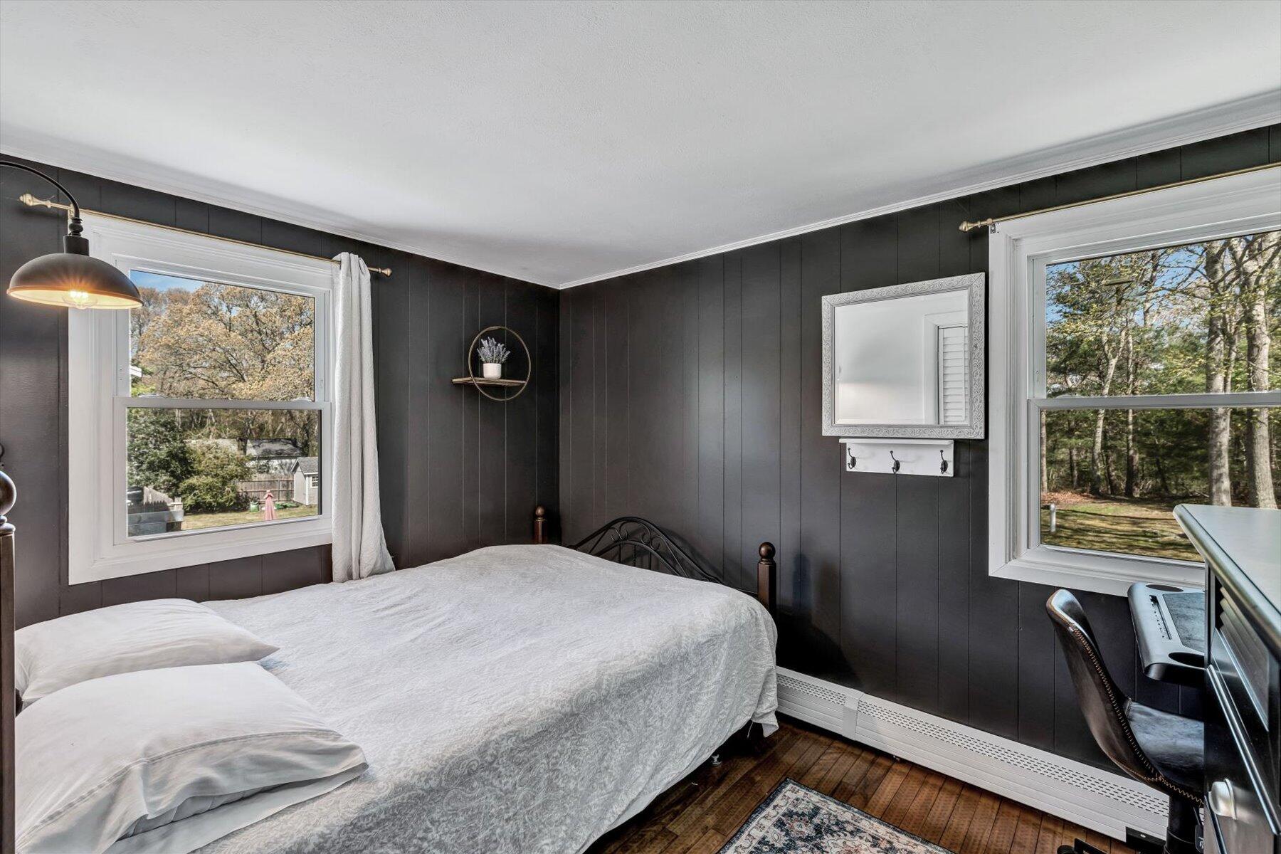 79 Clay Pond Road Monument Beach, MA 02532 - Photo 21 of 46 a bedroom with a bed and a window