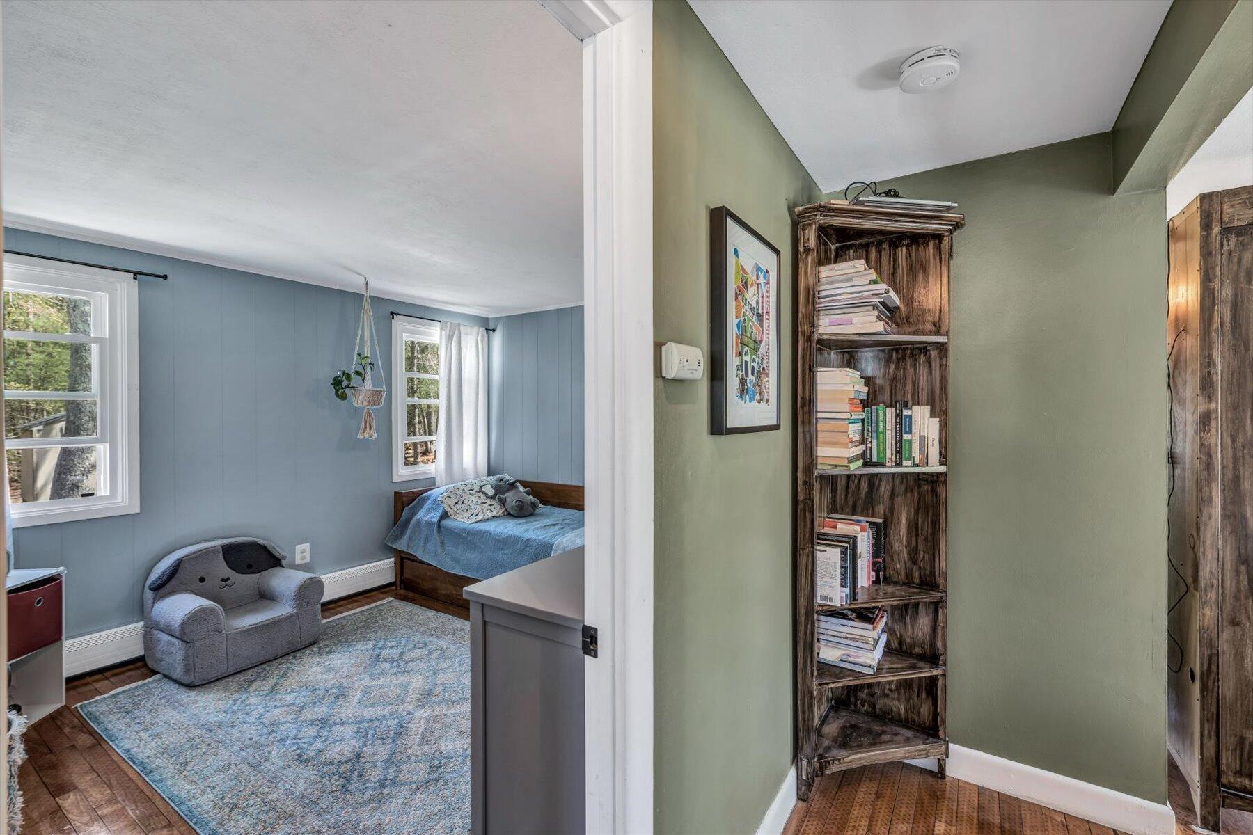 79 Clay Pond Road Monument Beach, MA 02532 - Photo 23 of 46 a bedroom with furniture and a window