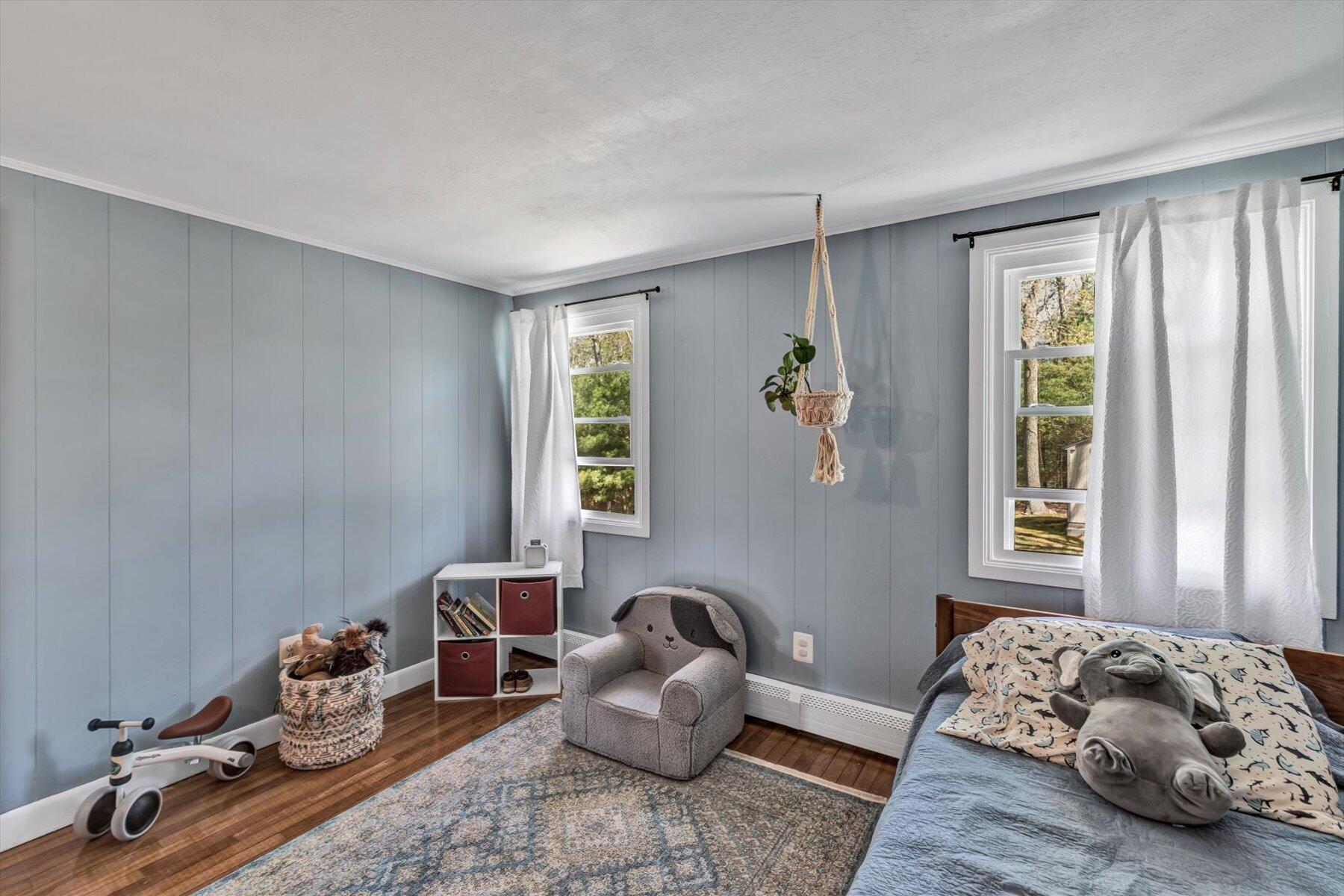79 Clay Pond Road Monument Beach, MA 02532 - Photo 25 of 46 a bedroom with furniture and a window