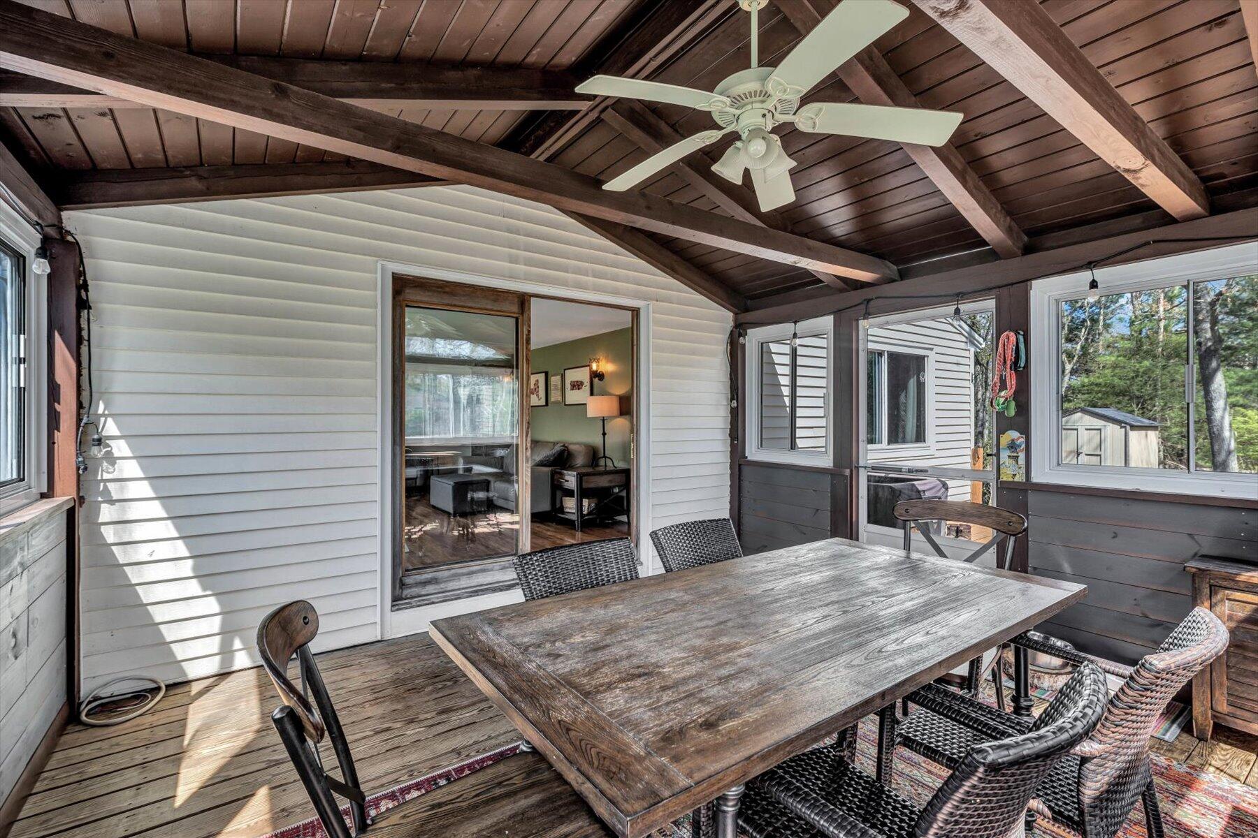 79 Clay Pond Road Monument Beach, MA 02532 - Photo 27 of 46 a roof deck with table and chairs