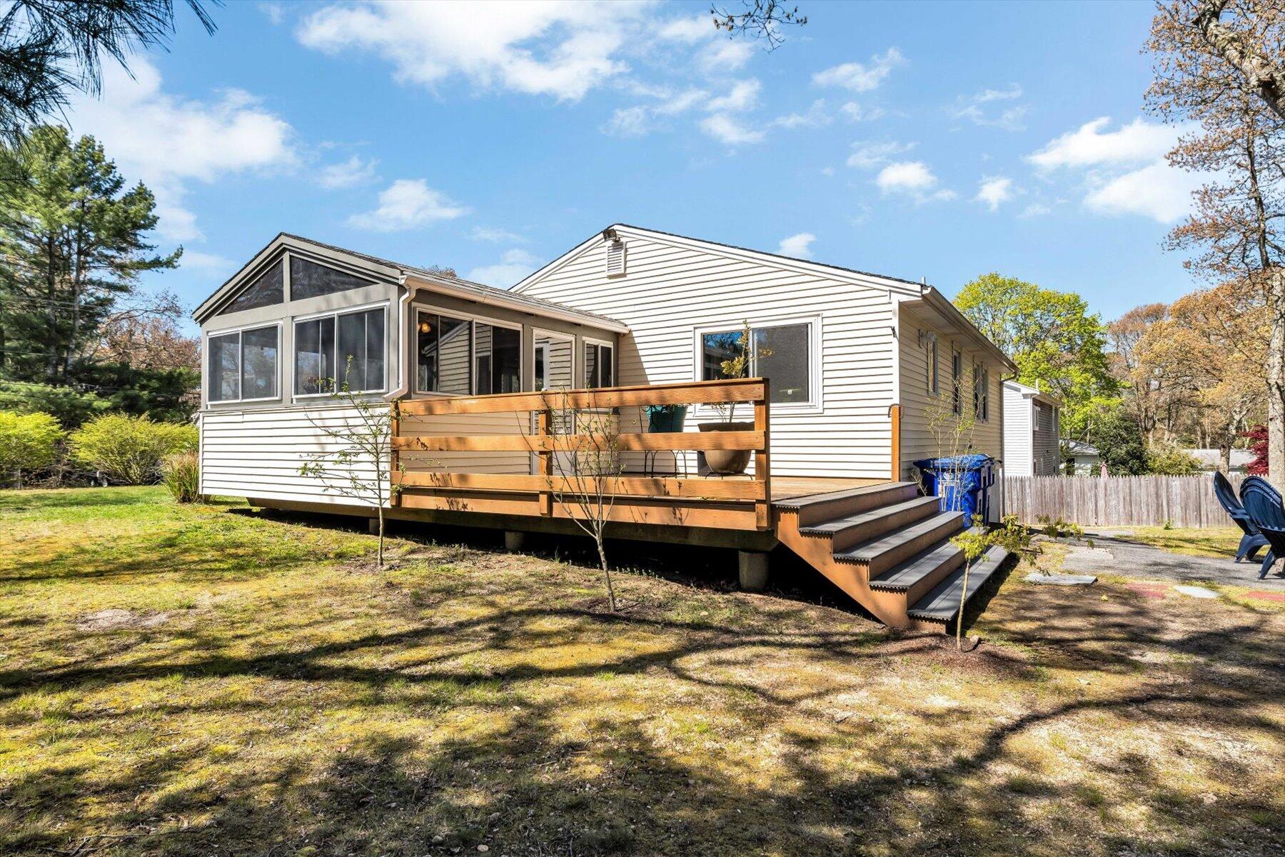 79 Clay Pond Road Monument Beach, MA 02532 - Photo 31 of 46 a house view with a garden space