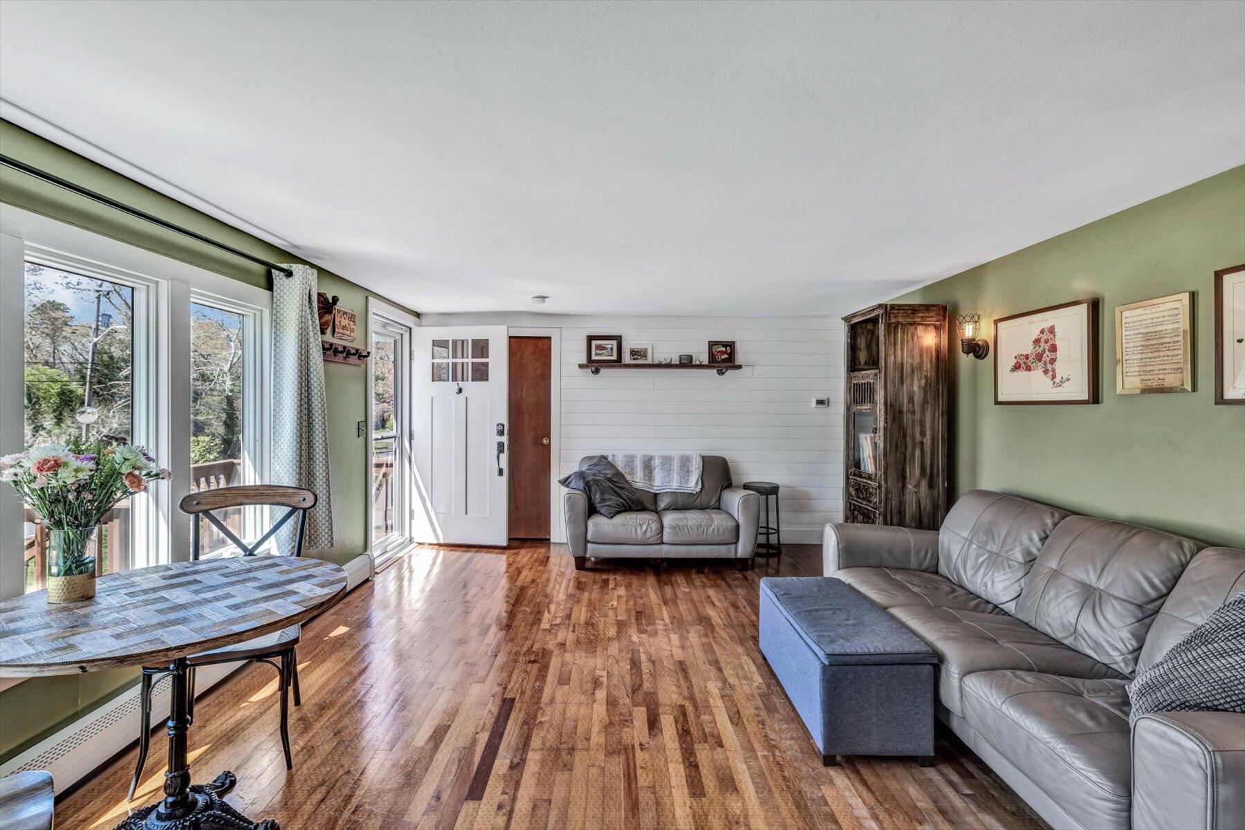 79 Clay Pond Road Monument Beach, MA 02532 - Photo 5 of 46 a living room with furniture and a large window