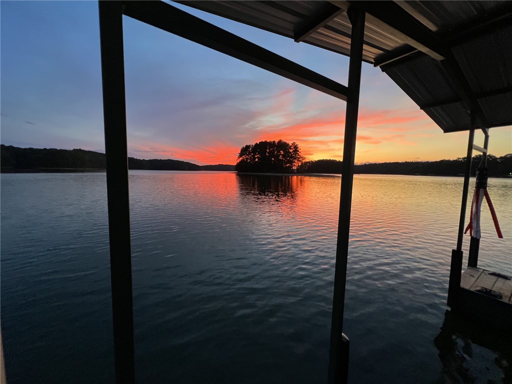 474 Overlook Drive Fair Play, SC 29643 - Photo 9 of 10 Breathtaking waterfront vistas capture a fiery sunset over tranquil waters, viewed from a private dock.