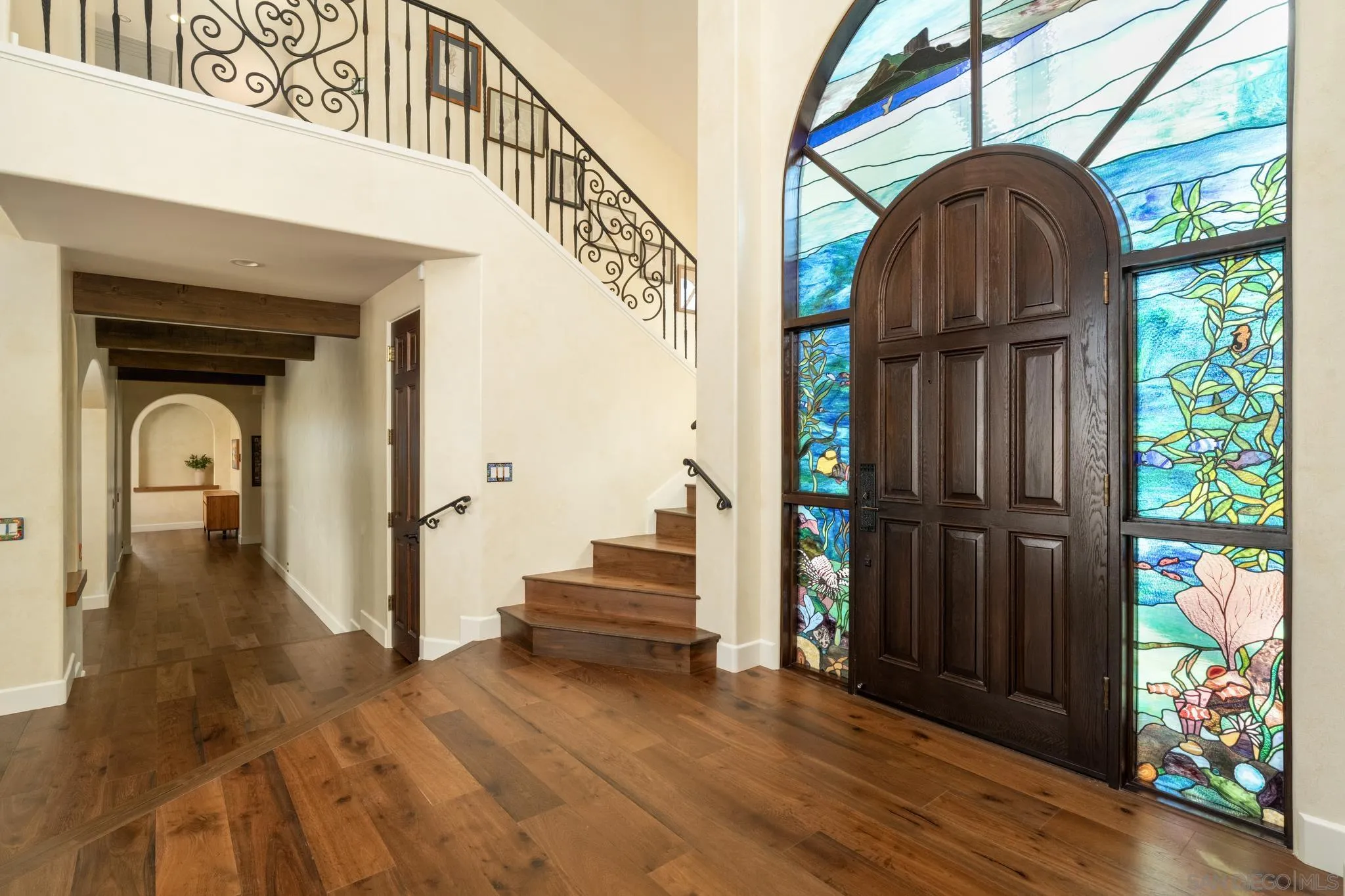 3028 Paseo Cielo Rancho Santa Fe, CA 92024 - Photo 30 of 50 a view of entryway with a front door and wooden floor