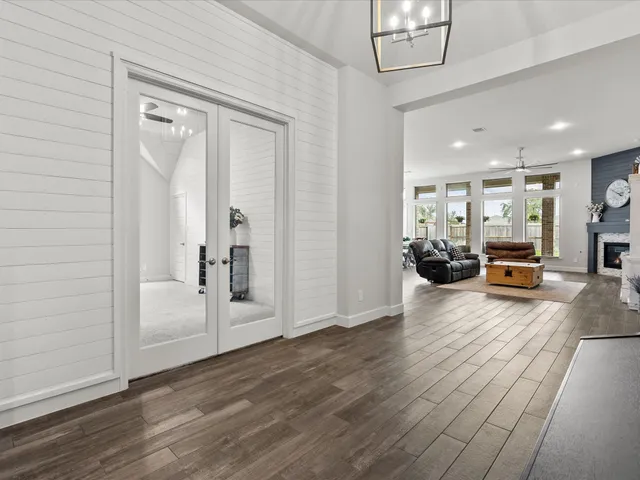 a view of living room with furniture and a window