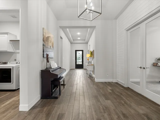 a view of livingroom with furniture and wooden floor