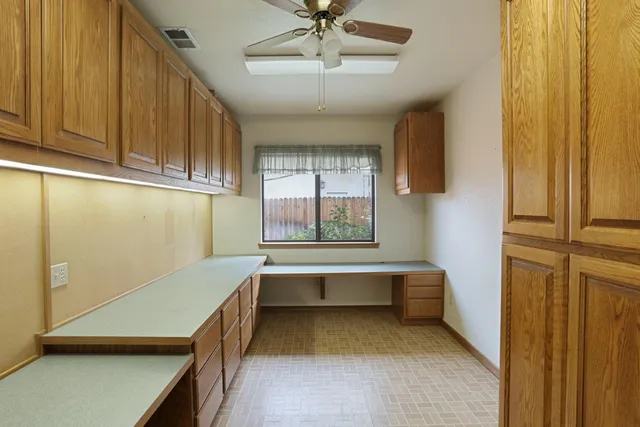 a bathroom with a bathtub and a window