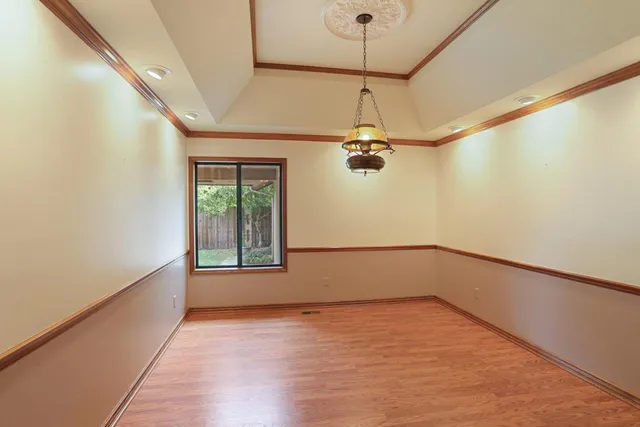 a view of a room with a large window