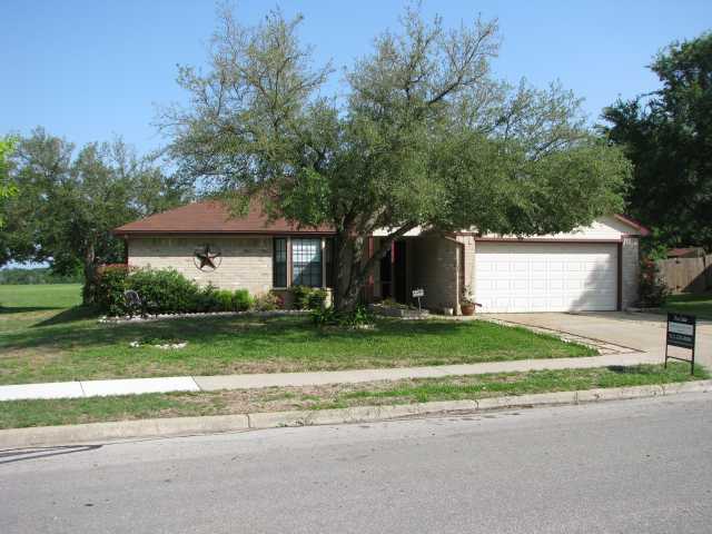 805 Pigeon Forge Road Pflugerville, TX 78660 - Photo 1 of 1 a view of a house with a yard and large tree