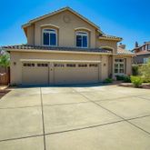 a view of a house with a garage