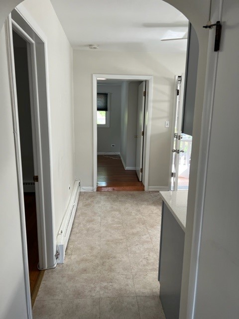 5454 West Windsor Avenue, Unit 2 Chicago, IL 60630 - Photo 6 of 12 view of a hallway with wooden shelves