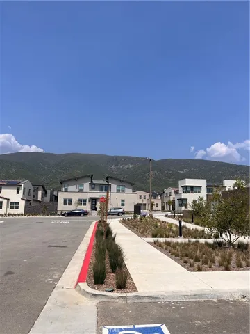 a view of houses with outdoor space and seating