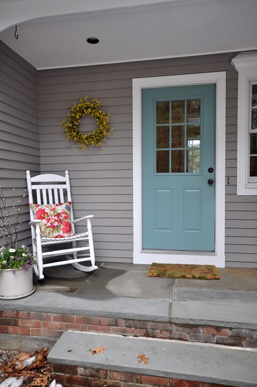 1055 Old Marlboro Road Concord, MA 01742 - Photo 15 of 19 a wooden bench sitting in front of a building
