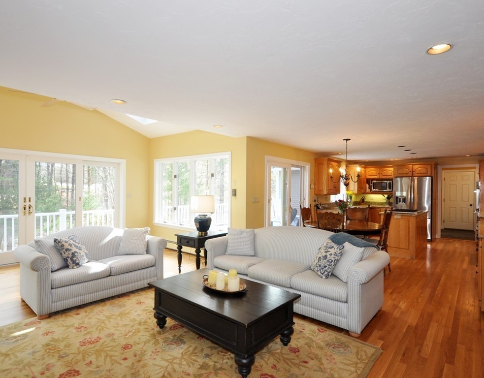 1055 Old Marlboro Road Concord, MA 01742 - Photo 5 of 19 a living room with furniture and a large window