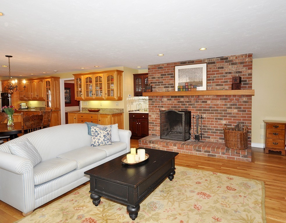 1055 Old Marlboro Road Concord, MA 01742 - Photo 6 of 19 a living room with furniture and a fireplace