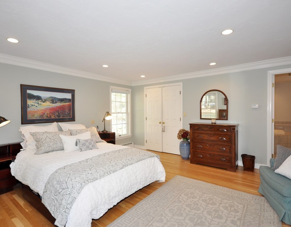1055 Old Marlboro Road Concord, MA 01742 - Photo 10 of 19 a bedroom with a bed and a dresser