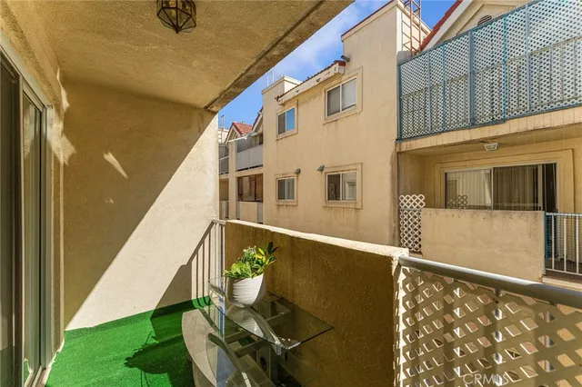 a view of balcony with furniture