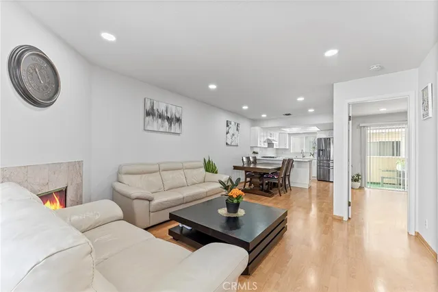a living room with furniture and a table
