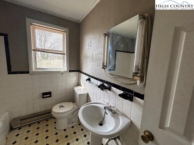 918 Emmanuel Church Road Conover, NC 28613 - Photo 3 of 17 a bathroom with a sink a toilet and mirror