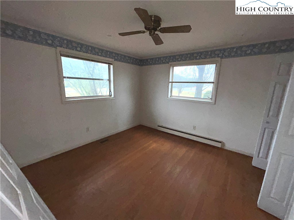 918 Emmanuel Church Road Conover, NC 28613 - Photo 6 of 17 a view of a room with an empty space and a window