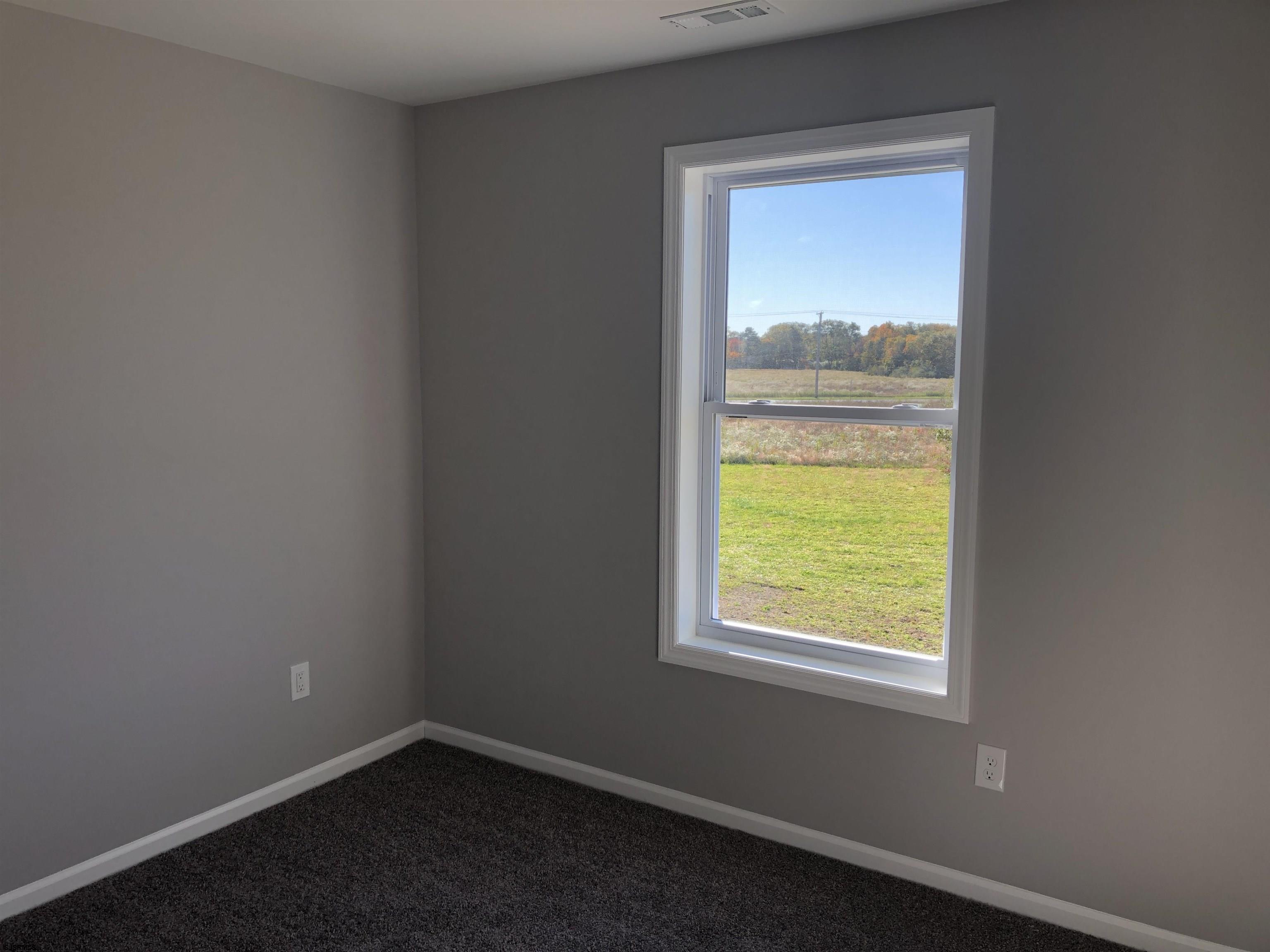 105 Wheat Road Vineland, NJ 08360 - Photo 19 of 30 a view of an empty room with a window