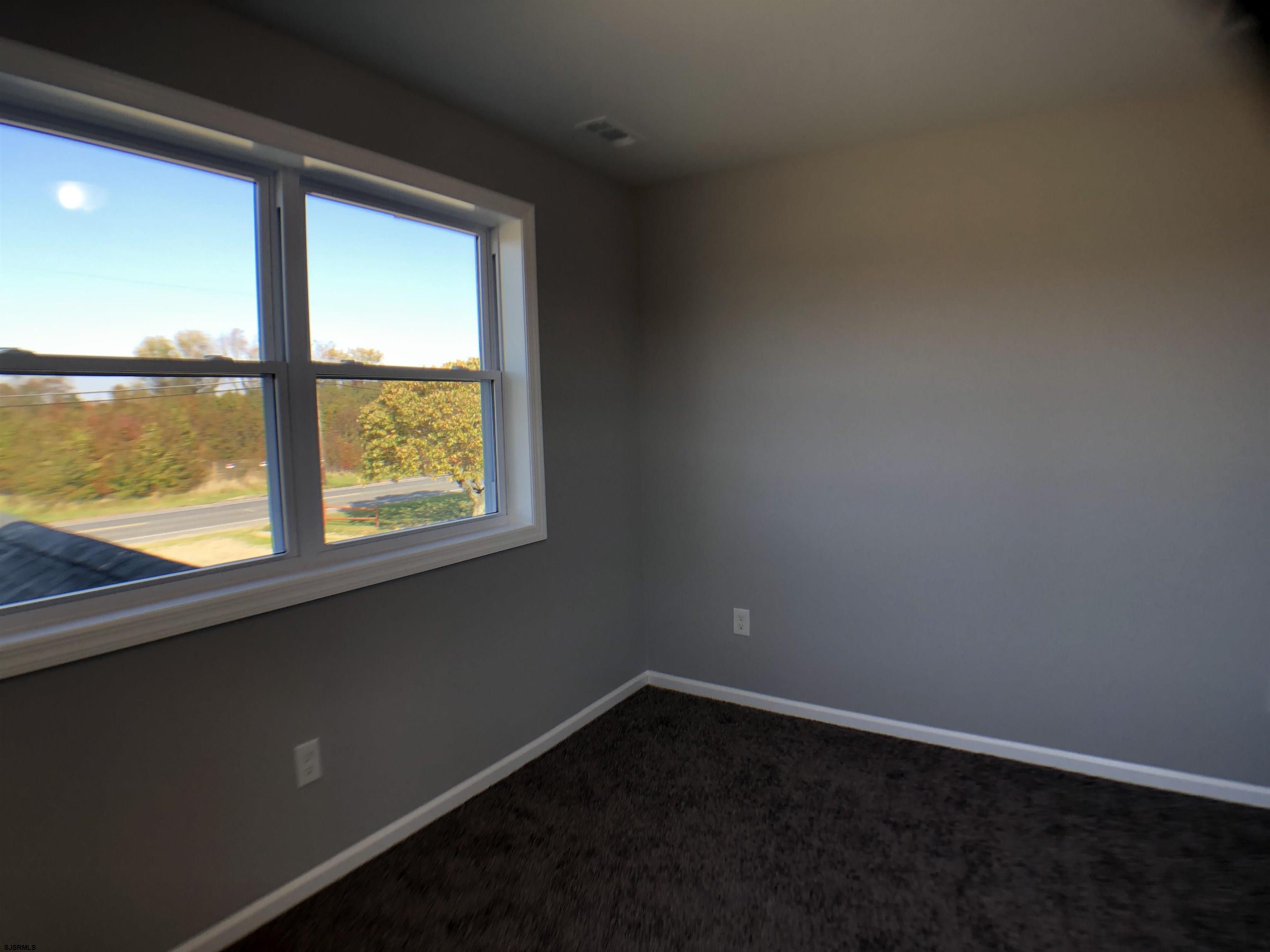 105 Wheat Road Vineland, NJ 08360 - Photo 20 of 30 a view of an empty room with a window