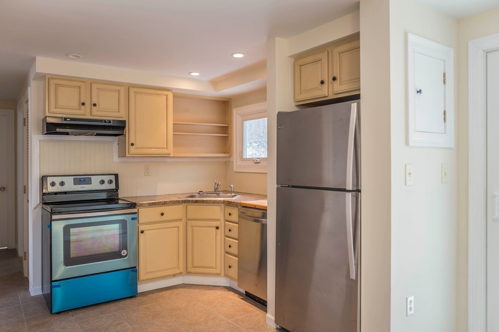 22 Sorel Road Ware, MA 01082 - Photo 3 of 15 a kitchen with a refrigerator sink and stove