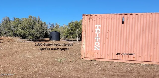 a view of a street with a building in the background