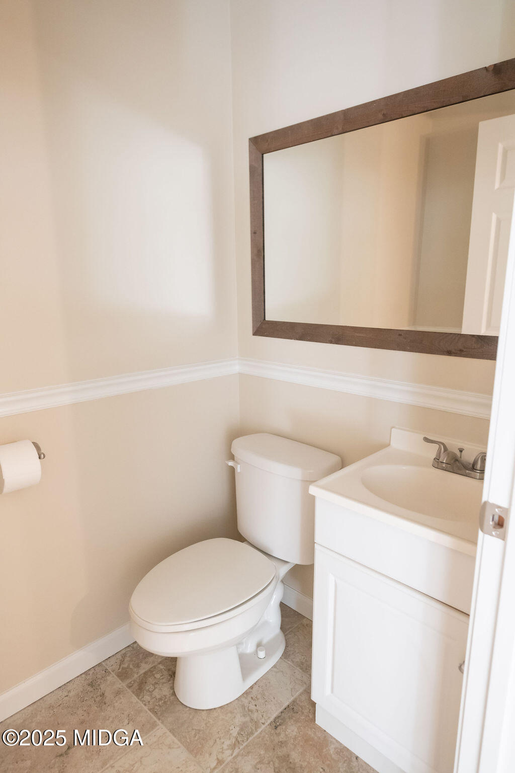 12820 Highway 87 Juliette, GA 31046 - Photo 17 of 57 a bathroom with a toilet a sink and a mirror