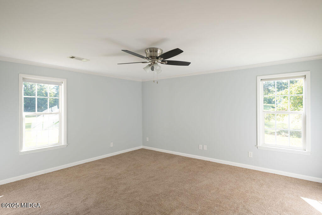 12820 Highway 87 Juliette, GA 31046 - Photo 22 of 57 a view of an empty room with a window