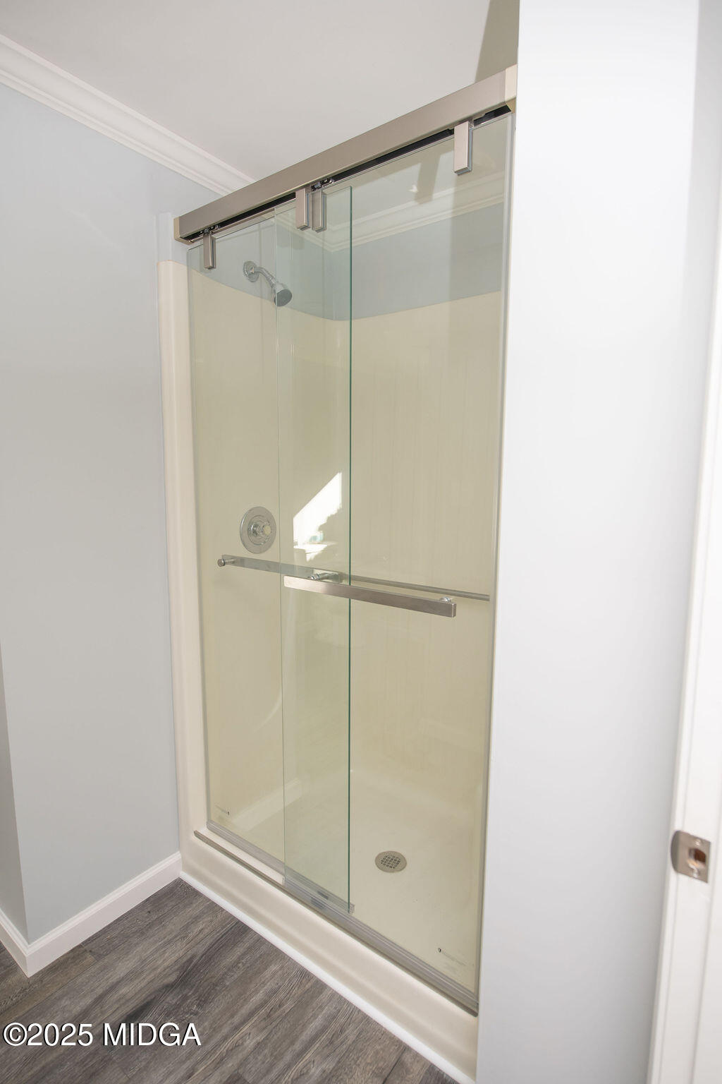 12820 Highway 87 Juliette, GA 31046 - Photo 27 of 57 a bathroom with a glass shower door