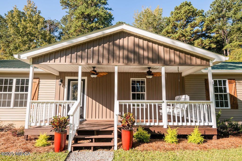 12820 Highway 87 Juliette, GA 31046 - Photo 4 of 57 front view of a house with a porch