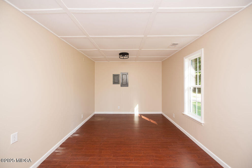 12820 Highway 87 Juliette, GA 31046 - Photo 46 of 57 a view of an empty room with wooden floor and a window