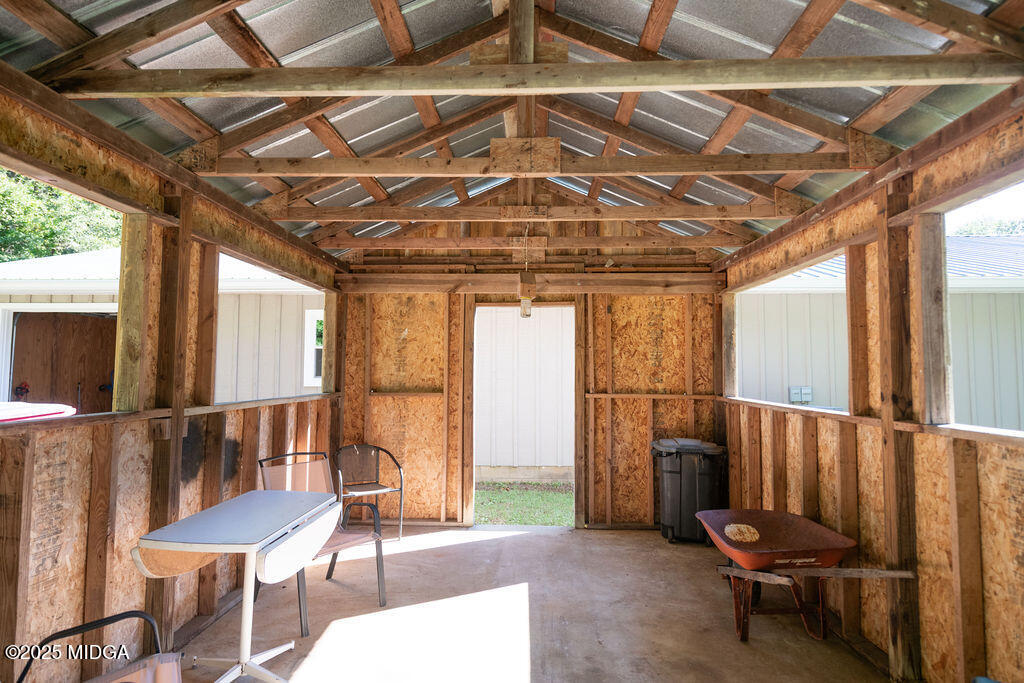 12820 Highway 87 Juliette, GA 31046 - Photo 54 of 57 a view of a room with table and chairs