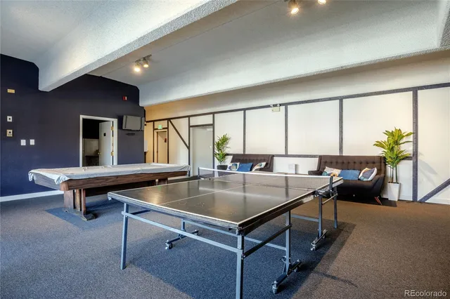 a room with lots of potted plants