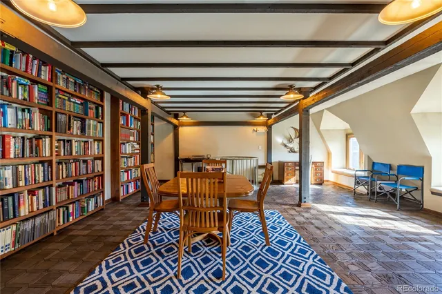a bathroom with a shower and a sink