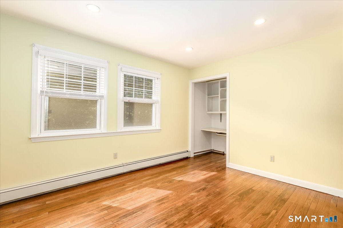 19 Botsford Hill Road Newtown, CT 06470 - Photo 28 of 40 an empty room with wooden floor and windows