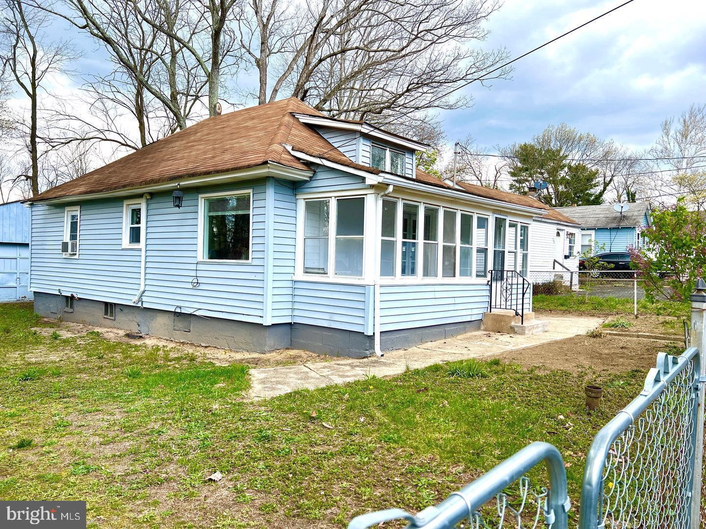 27 Rancocas Avenue Clementon, NJ 08021 - Photo 15 of 16 a view of a house with backyard and deck