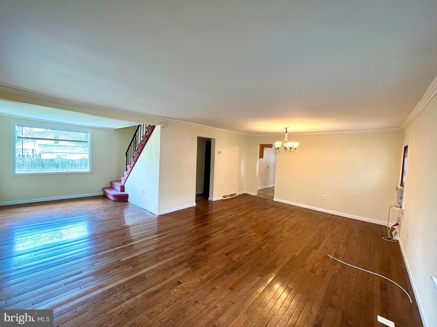 27 Rancocas Avenue Clementon, NJ 08021 - Photo 16 of 16 a view of a livingroom with wooden floor and window