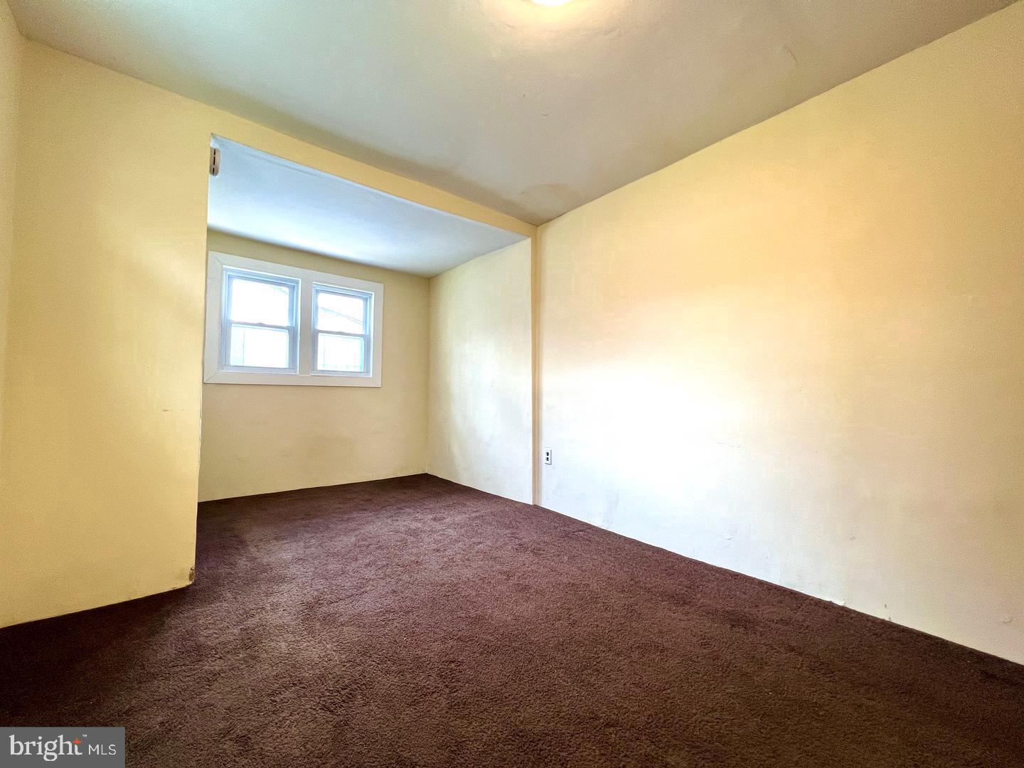 27 Rancocas Avenue Clementon, NJ 08021 - Photo 7 of 16 a view of an empty room with a window