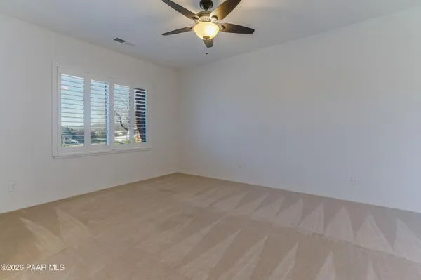 a kitchen with stainless steel appliances granite countertop a stove a refrigerator and a sink