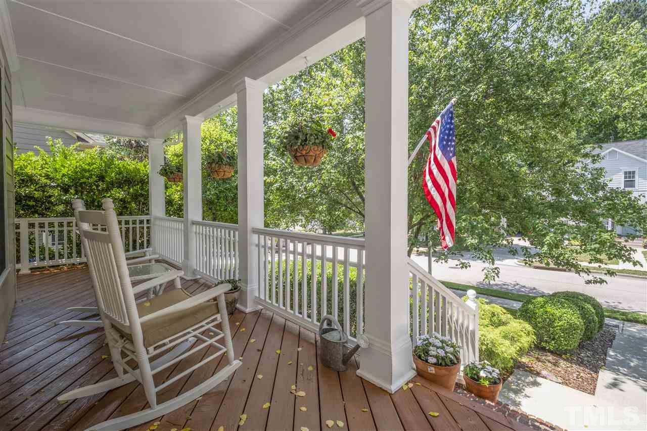 10228 River Bank Drive Raleigh, NC 27614 - Photo 2 of 29 a view of a balcony with wooden floor and outdoor space