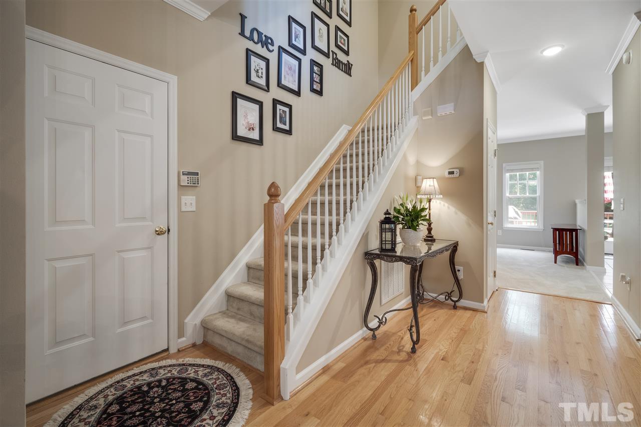 10228 River Bank Drive Raleigh, NC 27614 - Photo 11 of 29 a view of entryway and hall with wooden floor