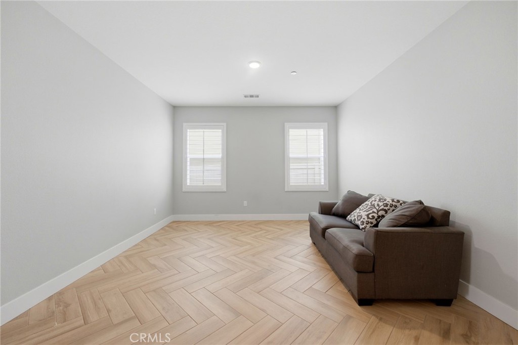 20948 Center Street Riverside, CA 92507 - Photo 16 of 92 a living room with furniture and a window