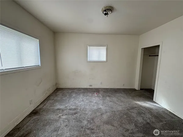an empty room with a window