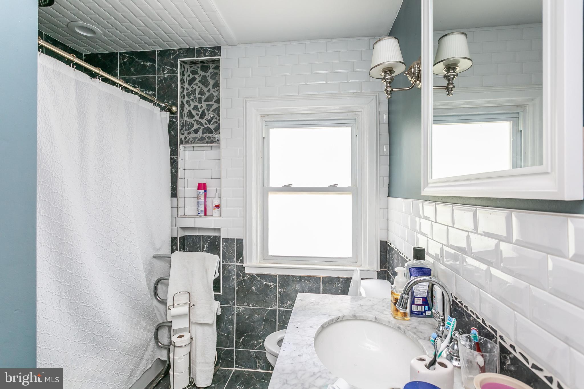 4205 Wentworth Road Baltimore, MD 21207 - Photo 11 of 33 Renovated full bath